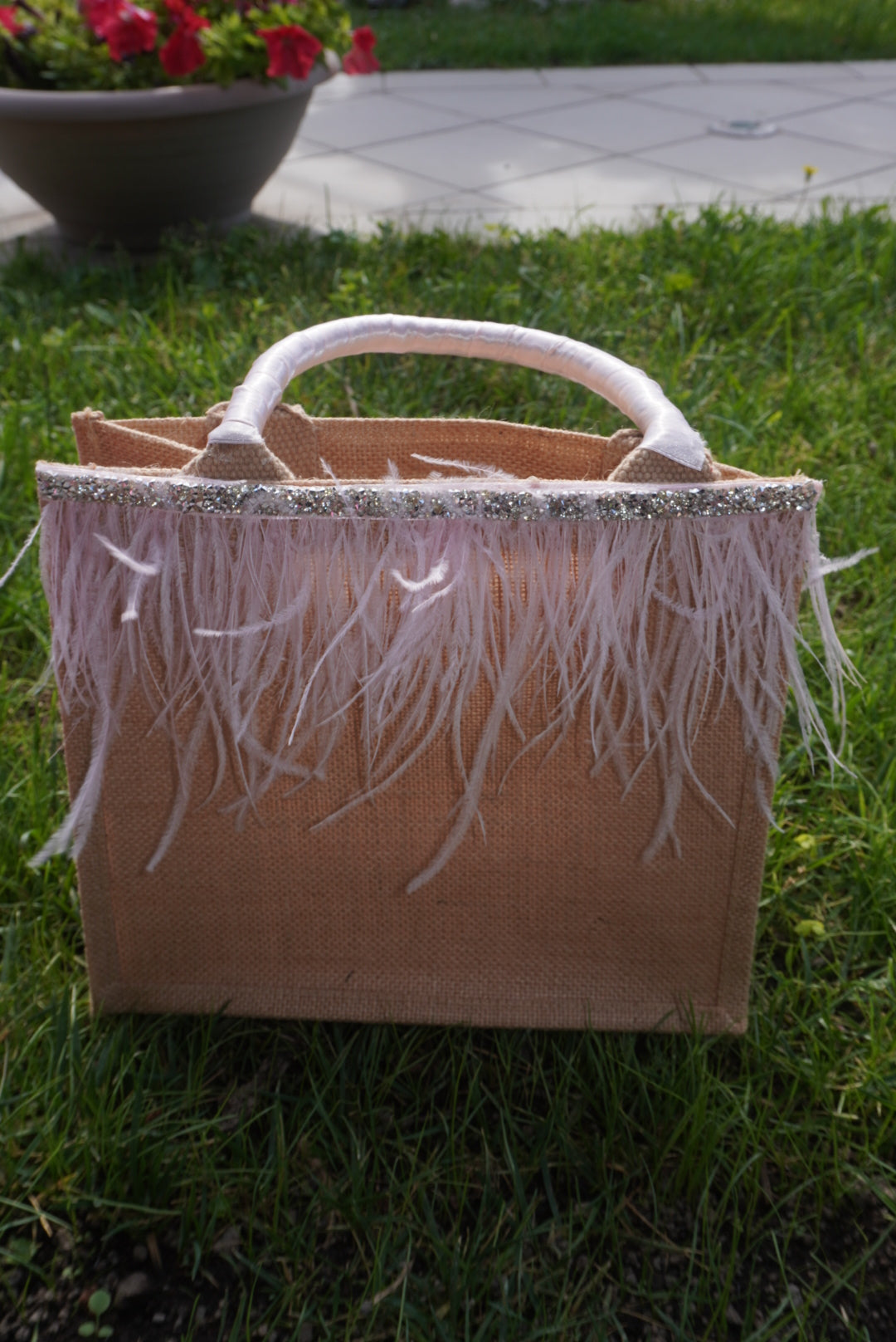 Bag in paglia con piume